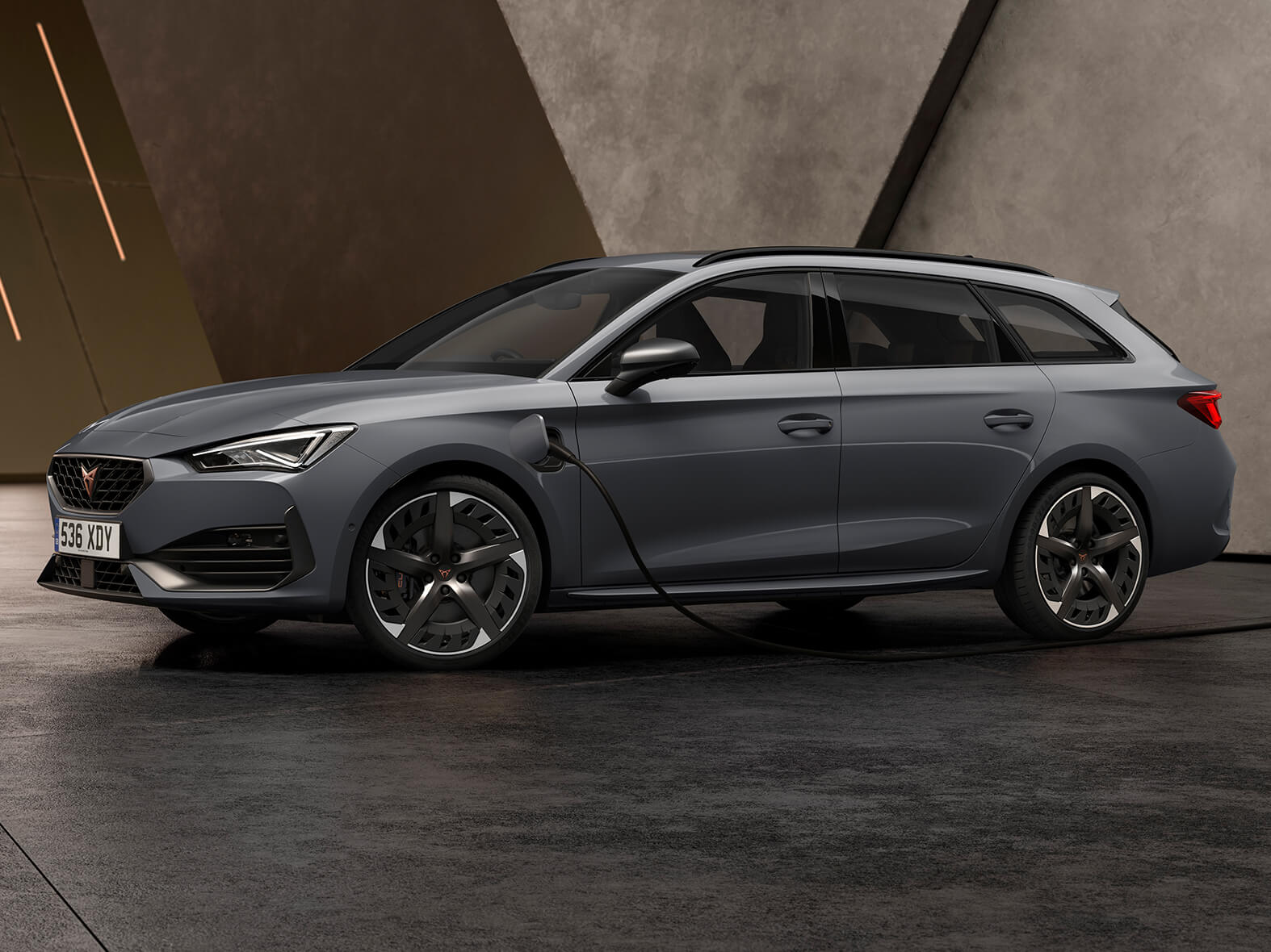 new CUPRA Leon Estate e-HYBRID Family Sports Car in graphene grey charging