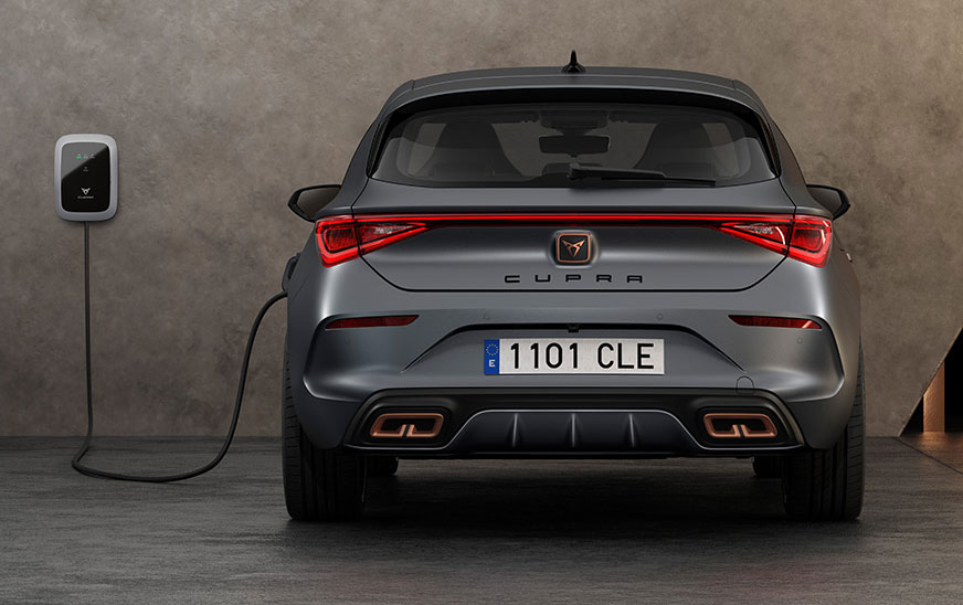 new CUPRA Leon ehybrid magnetic tech matte compact sports car rear view charging